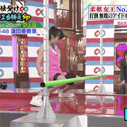 Flexible-Girl-Winning-On-a-Japanese-Game-Show-Doing-Limbo.gif